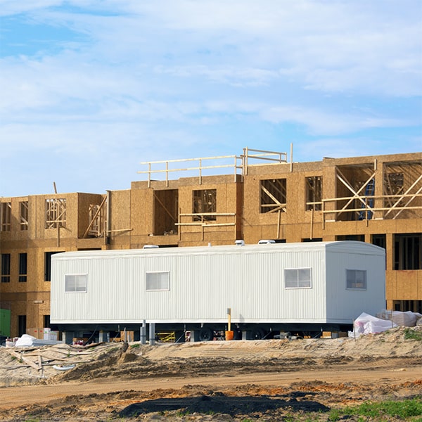construction site office trailers often include air conditioning, heating, electrical outlets, and desks for a comfortable work environment